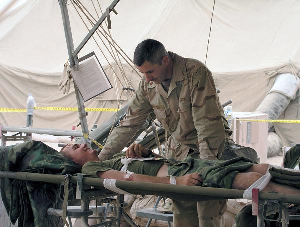 Navy Chaplain and Patient